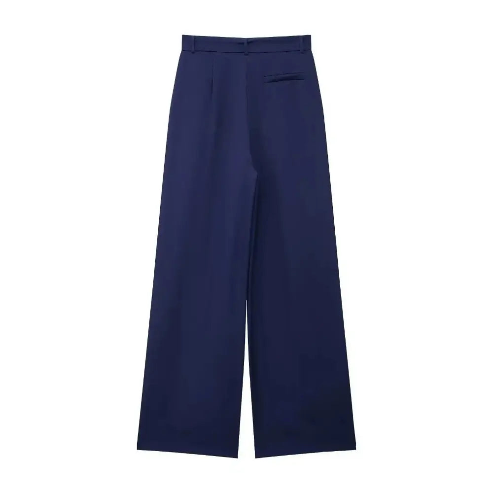 Vista traseira da calça feminina de alfaiataria azul marinho, com cintura alta, presilhas de cinto e bolso falso traseiro, exibida em fundo branco.