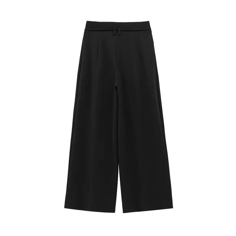 Calça pantalona feminina de alfaiataria preta, com cintura alta e cinto fino, exibida em fundo branco.