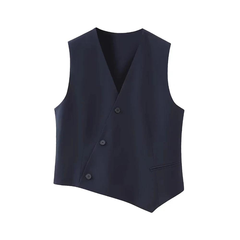 Colete feminino de alfaiataria azul marinho com design assimétrico, decote V, botões pretos diagonais e bolso falso, exibido em fundo branco.