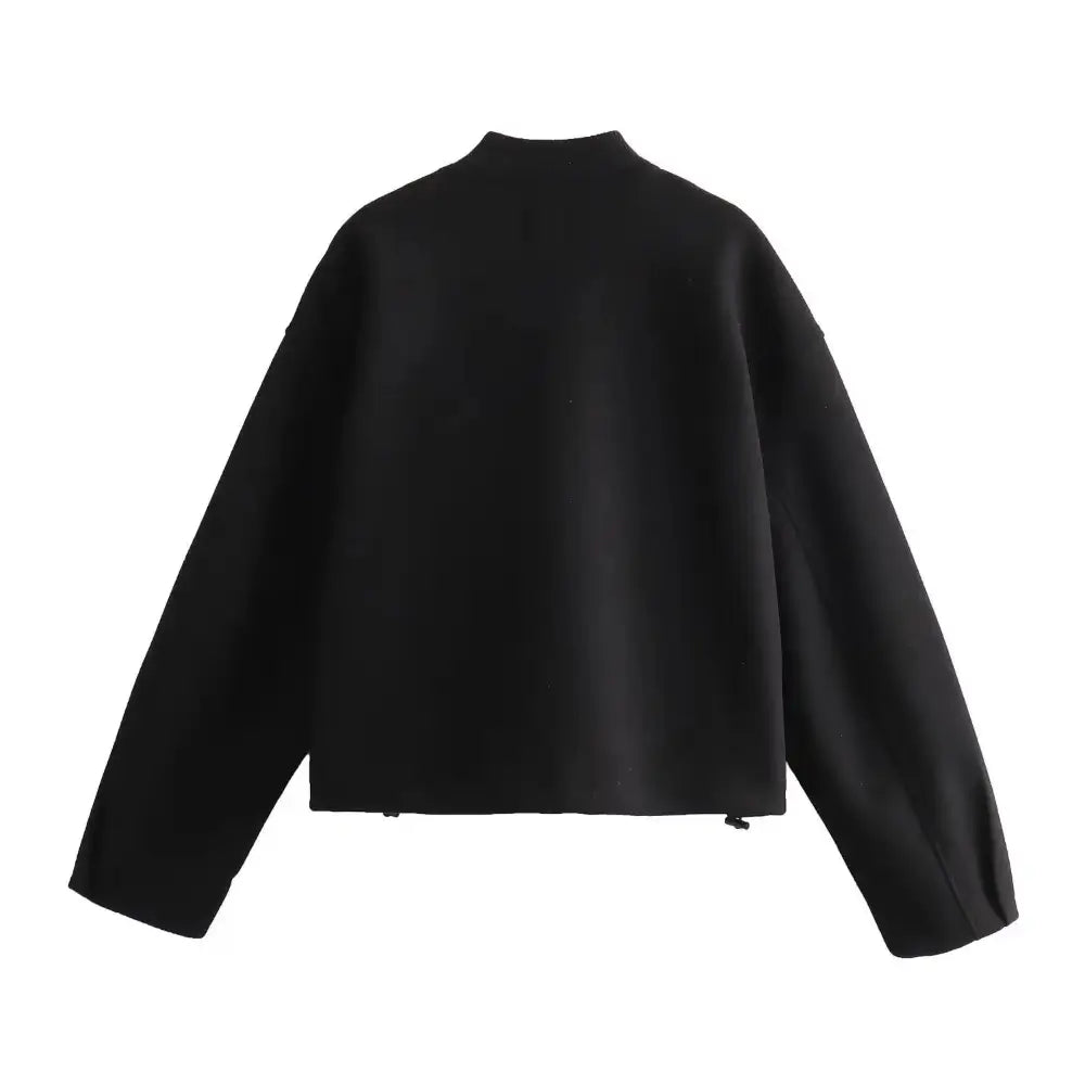 Vista traseira da jaqueta bomber feminina preta, com gola canelada, exibida sobre fundo branco.